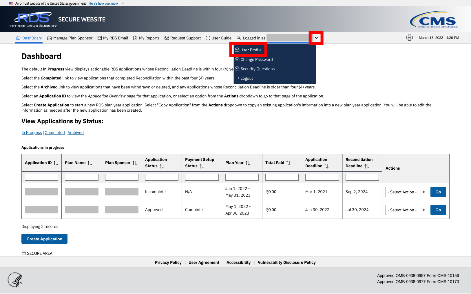 Dashboard page with sample data. User dropdown is open in top nav, and User Profile is highlighted.